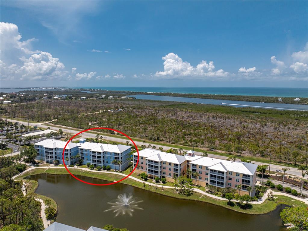 8405 Placida Road, Unit 406 Placida, FL 33946 - Photo 41 of 55 a view of a lake with a city