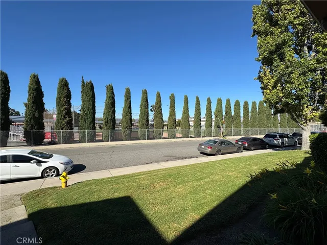 a view of yard with swimming pool and outdoor seating