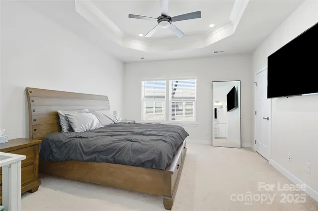 a bathroom with double vanity sink and a mirror