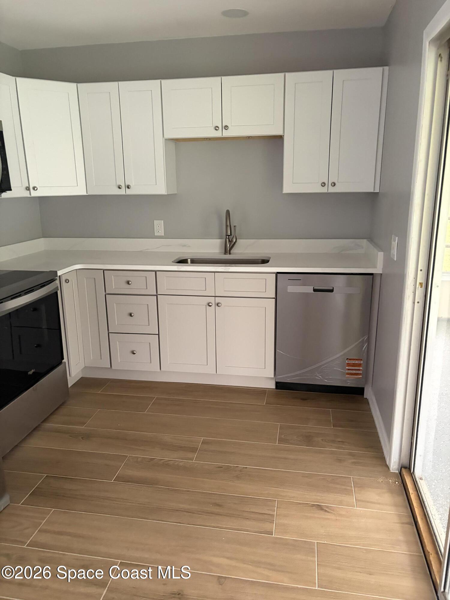 1136 Minnet Court Northeast Palm Bay, FL 32905 - Photo 25 of 31 Kitchen 2 - Copy
