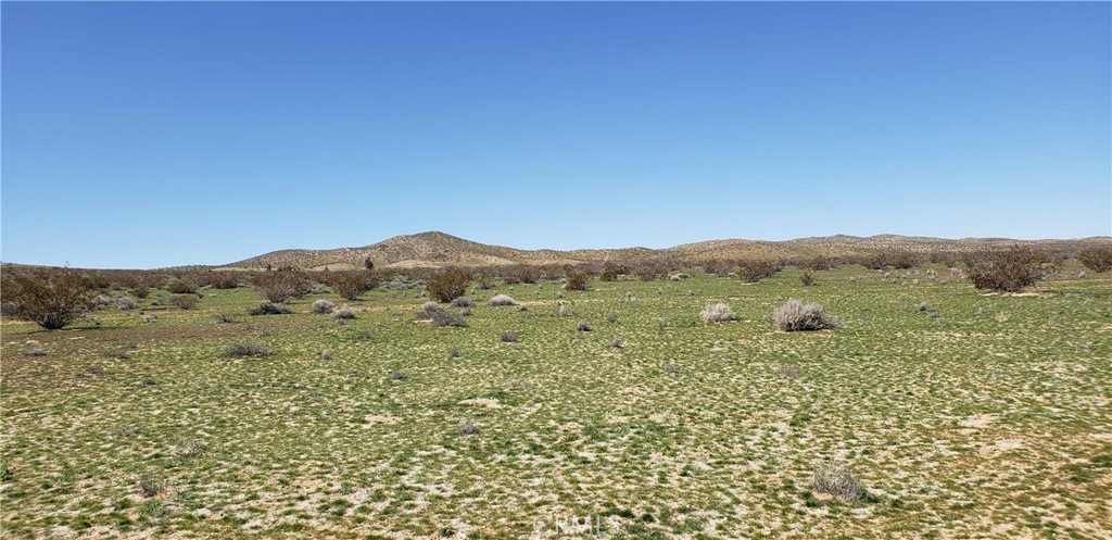 39177 Hinkley Road Hinkley, CA 92347 - Photo 3 of 13 a view of a large body of water with a mountain in the background