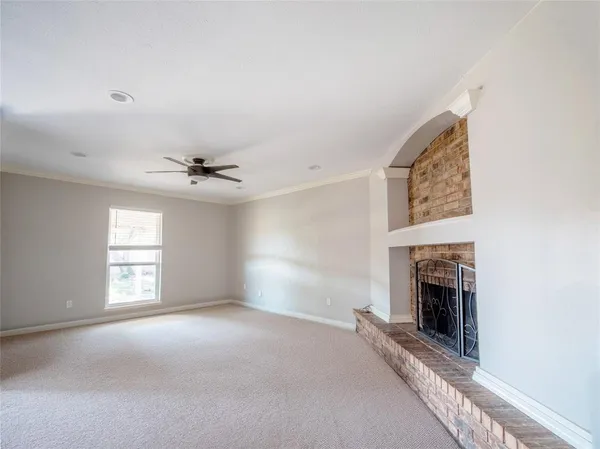 a view of livingroom window and fireplace