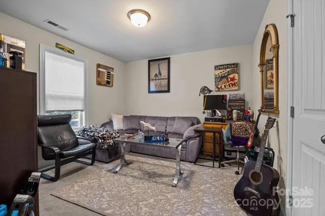 a bed room with a bed and a couch