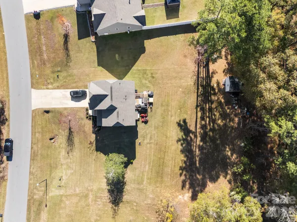 aerial view of residential houses with outdoor space