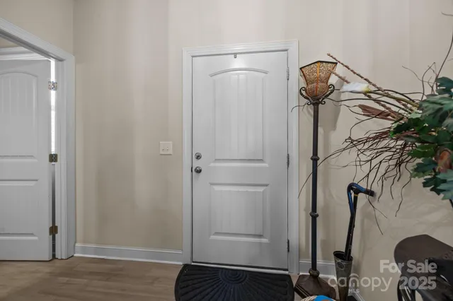 a living room with furniture fireplace and a flat screen tv