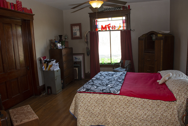 16477 Capp Road Morrison, IL 61270 - Photo 19 of 39 a bedroom with a bed and a lamp on dresser