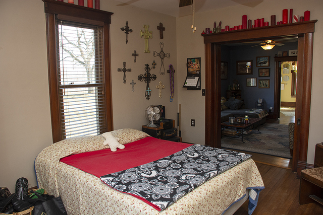 16477 Capp Road Morrison, IL 61270 - Photo 20 of 39 a bedroom with a bed and a large mirror with a potted plant
