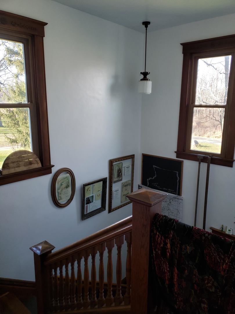 16477 Capp Road Morrison, IL 61270 - Photo 24 of 39 a view of workspace with wooden floor windows