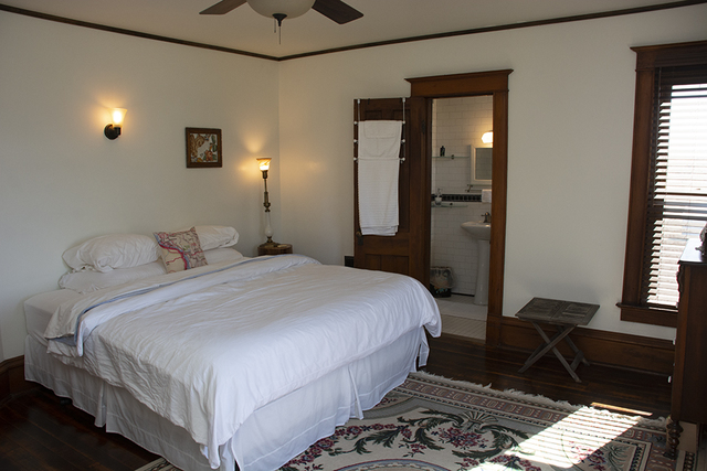 16477 Capp Road Morrison, IL 61270 - Photo 25 of 39 a bedroom with a bed and wooden floor