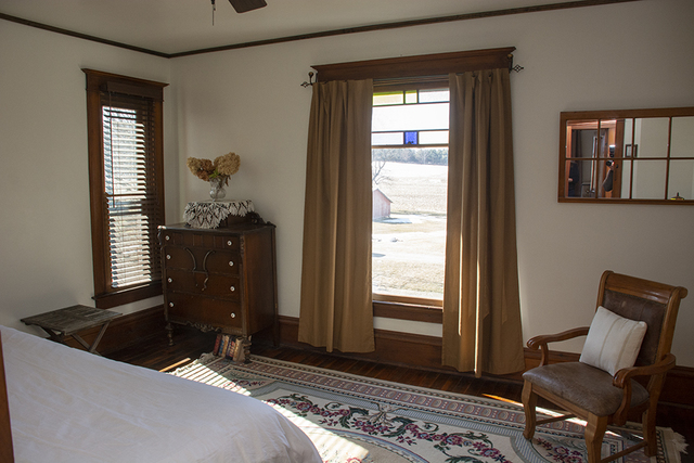 16477 Capp Road Morrison, IL 61270 - Photo 29 of 39 a bedroom with a bed and wooden floor