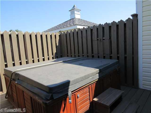 1010 Westmoreland Farm Road King, NC 27021 - Photo 12 of 16 Exterior Front. The hot tub area is totally enclosed with a privacy fenced with private access from the master bedroom