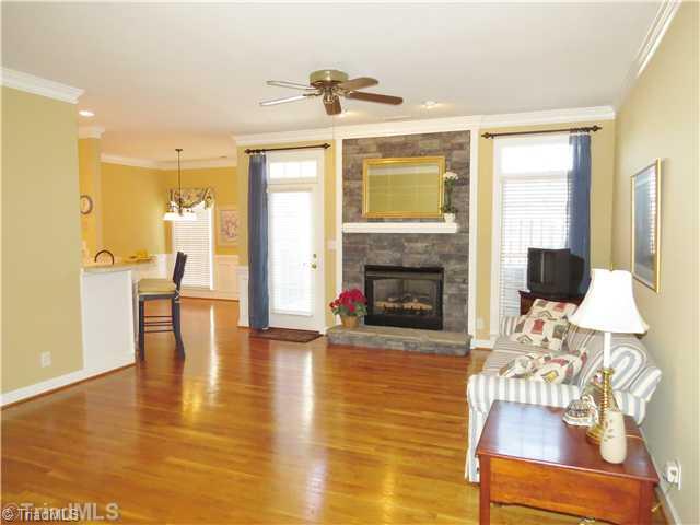 1010 Westmoreland Farm Road King, NC 27021 - Photo 5 of 16 Living Room. The living room provides a large open space with many options to position any style of living room furniture. The living room offers a beautiful rock fireplace with gas logs, hardwood floors, crown molding and easy access to the kitchen.