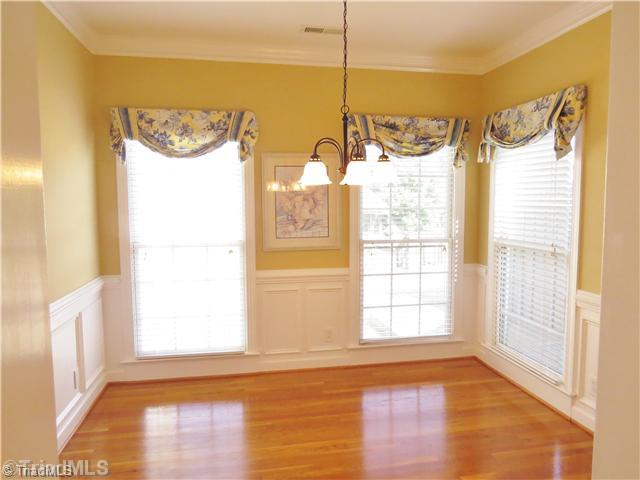 1010 Westmoreland Farm Road King, NC 27021 - Photo 7 of 16 Dining Room. The formal dining room is just off the kitchen and offers beautiful hardwood floors, crown molding and surrounded by stunning picture frame moldings and bright windows.