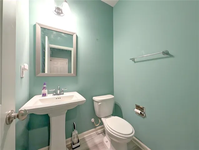 a bathroom with a tub and sink