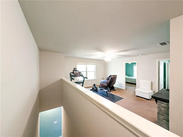 a bathroom with a tub and a sink