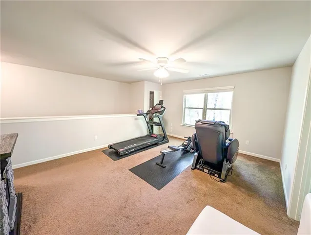 a bathroom with a tub and shower