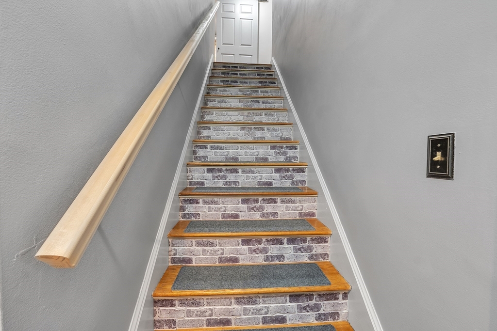 22 Lanark Street Worcester, MA 01603 - Photo 14 of 33 a view of staircase with white walls