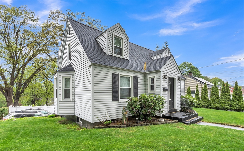22 Lanark Street Worcester, MA 01603 - Photo 2 of 33 a front view of a house with a yard