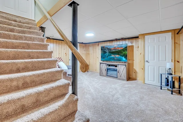 a view of livingroom with furniture and stairs