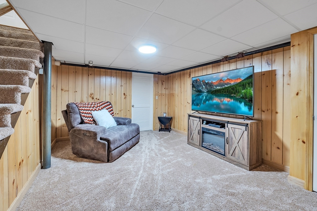 22 Lanark Street Worcester, MA 01603 - Photo 24 of 33 a living room with furniture and a flat screen tv