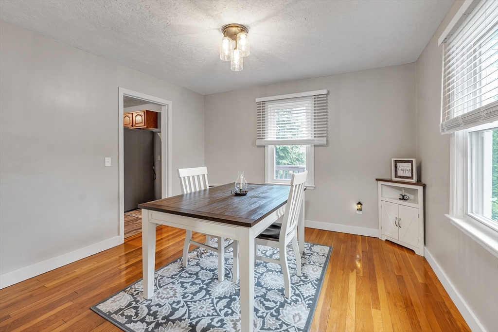 22 Lanark Street Worcester, MA 01603 - Photo 7 of 33 a room with table and window