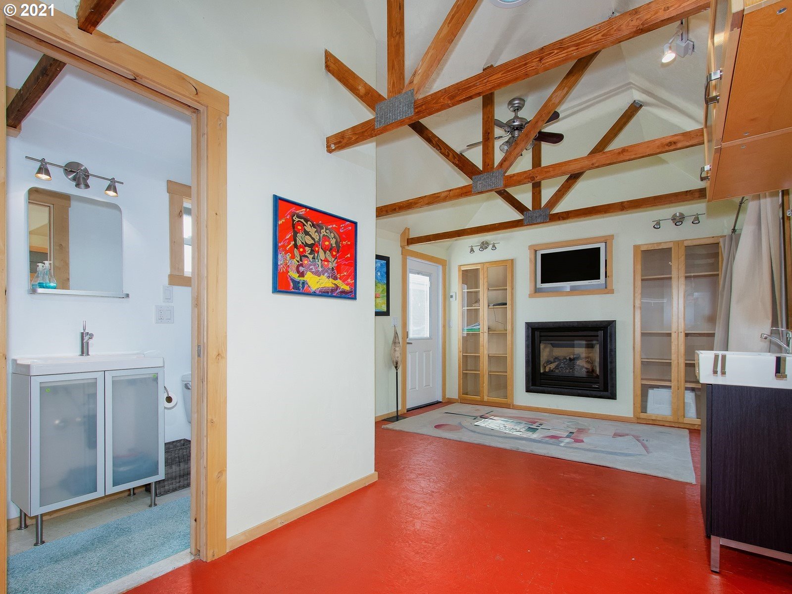 7720 South Macadam Avenue, Unit 8 Portland, OR 97219 - Photo 15 of 32 a view of livingroom with furniture and fireplace