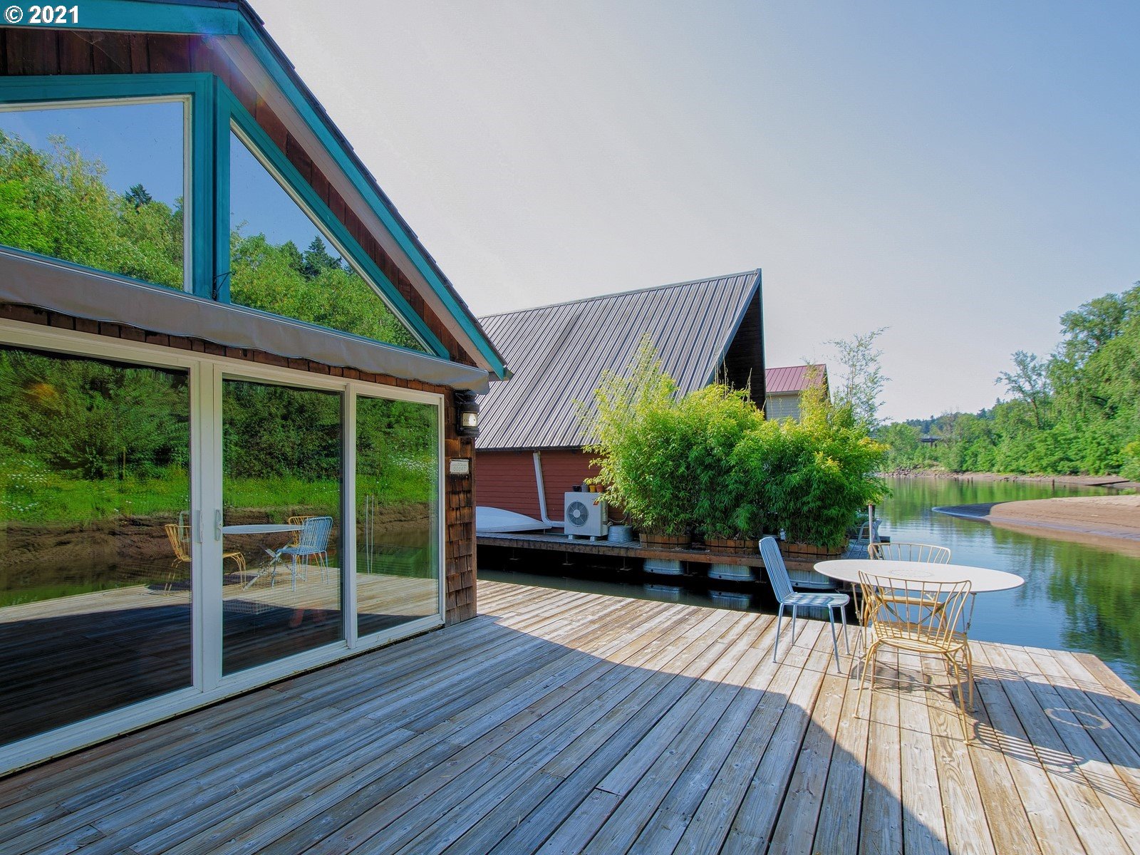 7720 South Macadam Avenue, Unit 8 Portland, OR 97219 - Photo 26 of 32 a view of house with patio outdoor seating and wooden floor