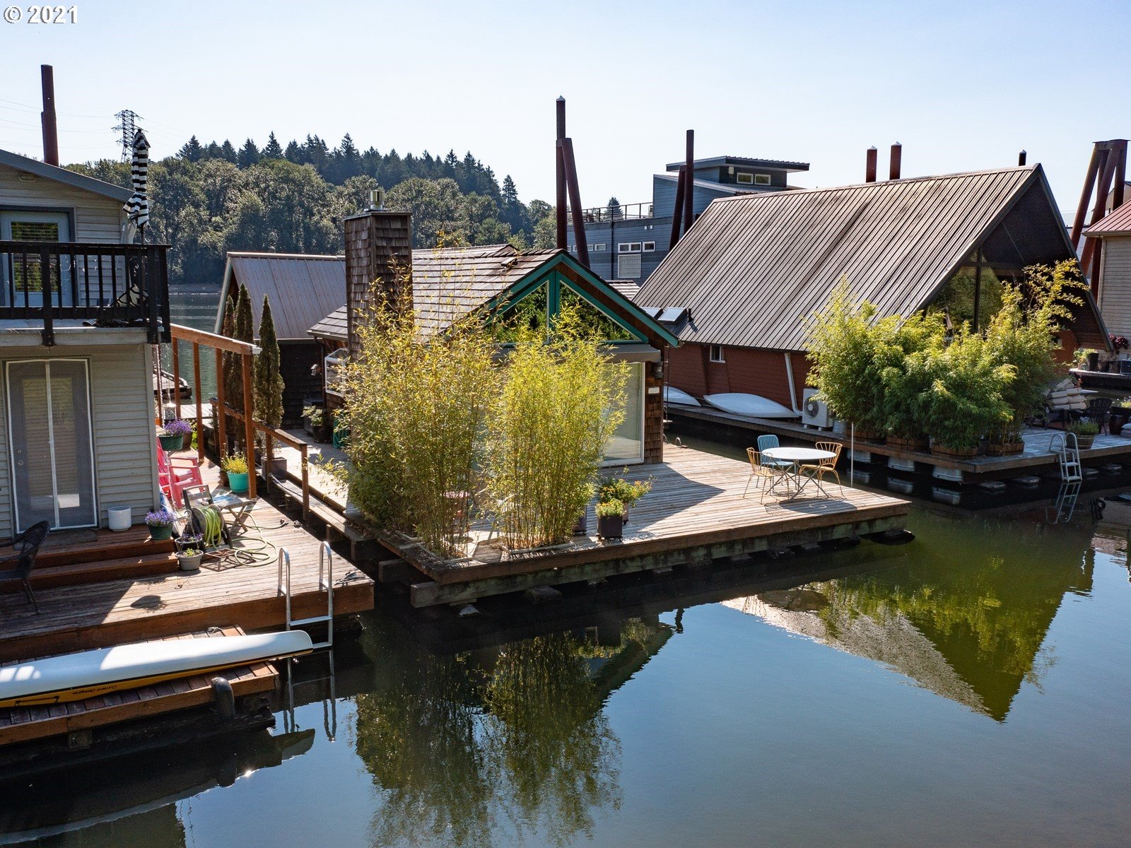 7720 South Macadam Avenue, Unit 8 Portland, OR 97219 - Photo 31 of 32 a view of a house with pool and deck