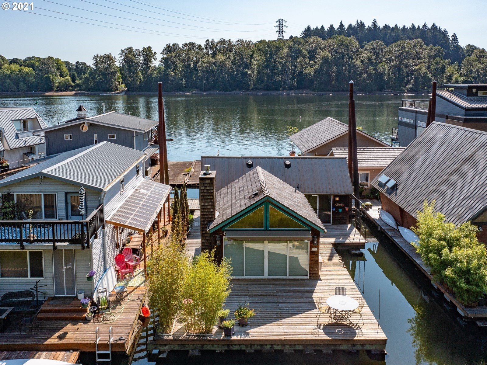 7720 South Macadam Avenue, Unit 8 Portland, OR 97219 - Photo 32 of 32 a view of a house with a yard and lake view