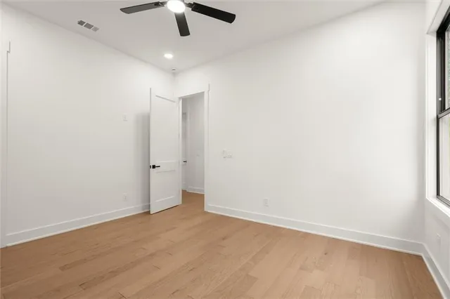 a picture of a bathroom with a sink and a mirror
