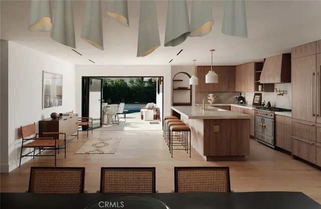 a living room with furniture large window and a flat screen tv