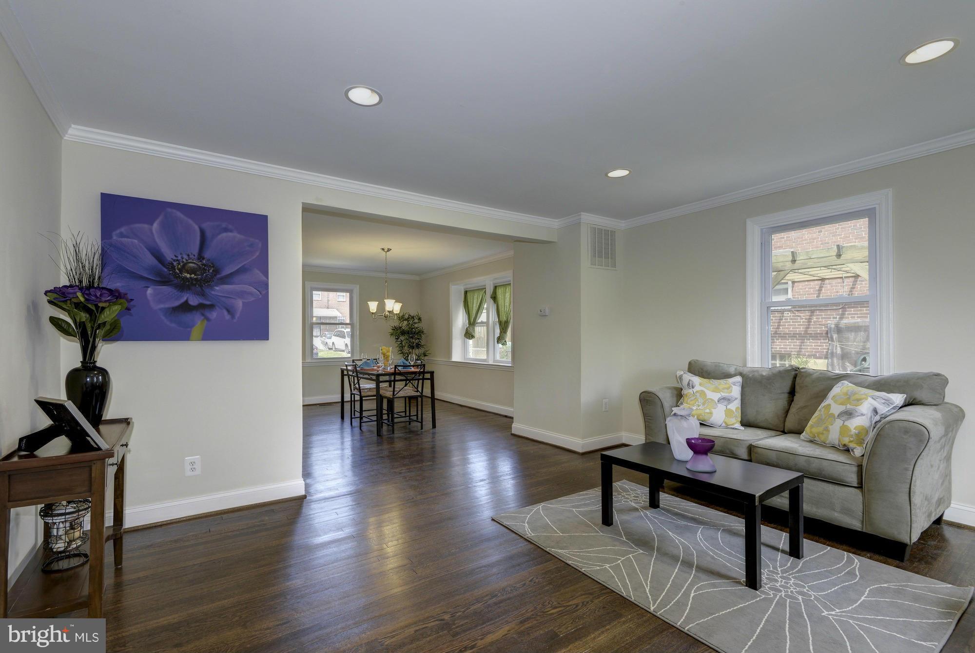 1901 Swansea Road Baltimore, MD 21239 - Photo 4 of 28 a living room with furniture and wooden floor