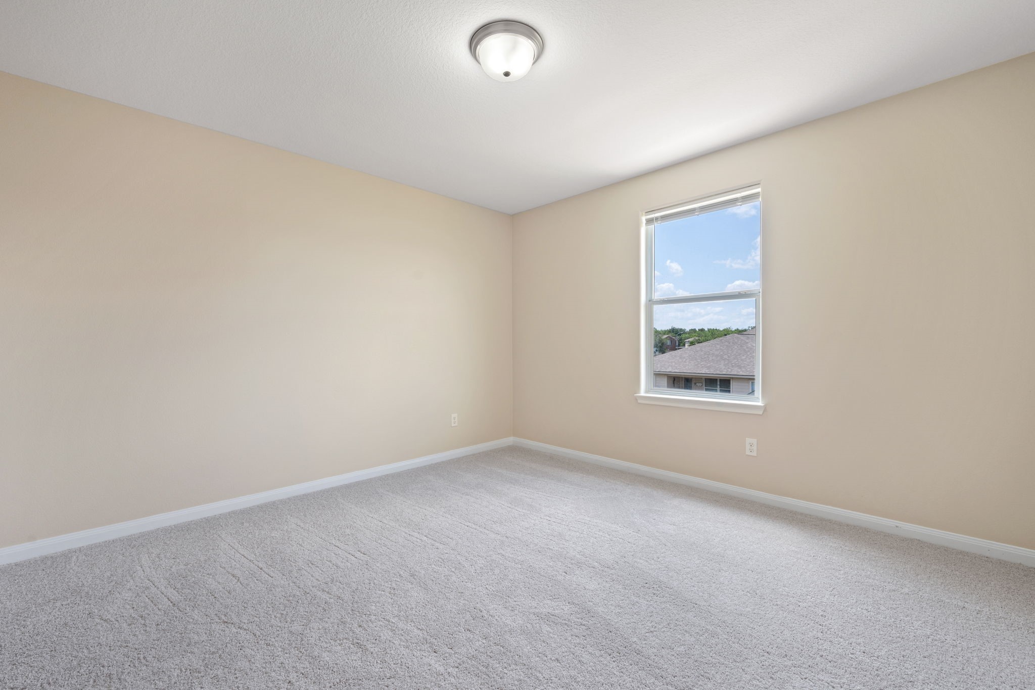 803 Marigold Road Baytown, TX 77521 - Photo 25 of 31 an empty room with a window
