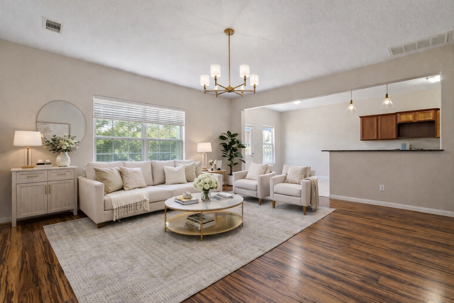803 Marigold Road Baytown, TX 77521 - Photo 8 of 31 a living room with furniture and a chandelier