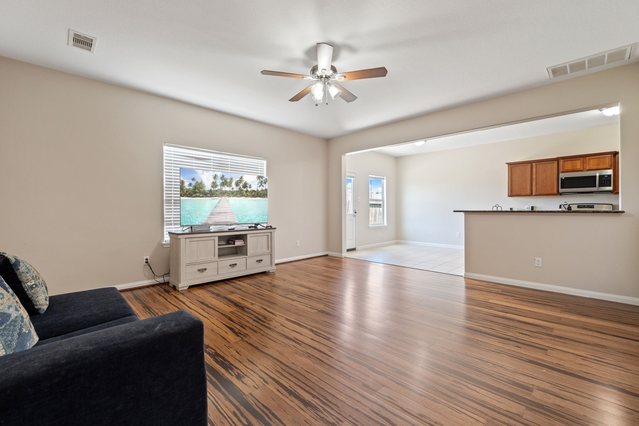 803 Marigold Road Baytown, TX 77521 - Photo 9 of 31 a living room with furniture and a ceiling fan