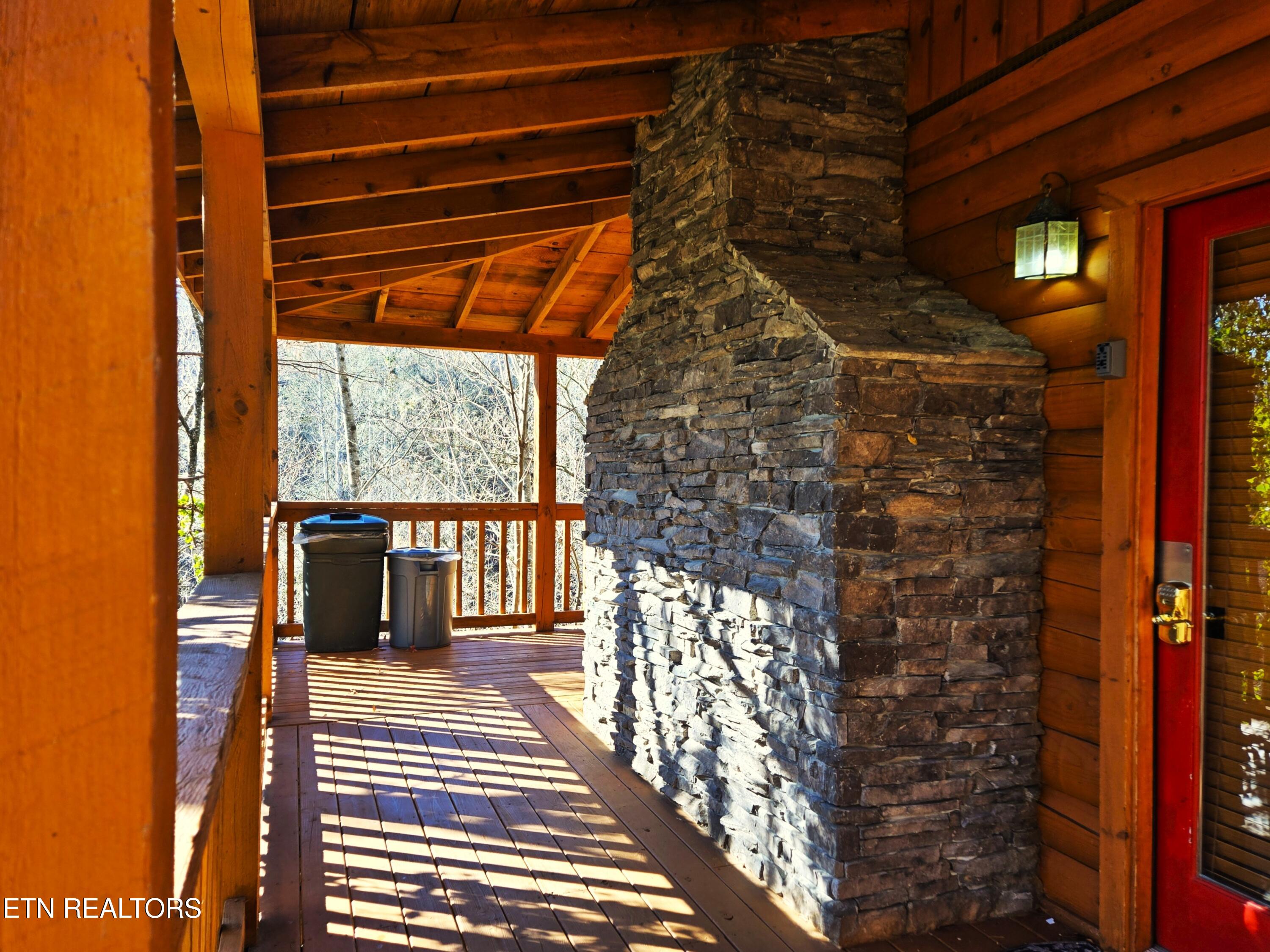 1580 Walt Price Road Sevierville, TN 37876 - Photo 4 of 37 1580 WPR EXT Entry Porch Fireplace