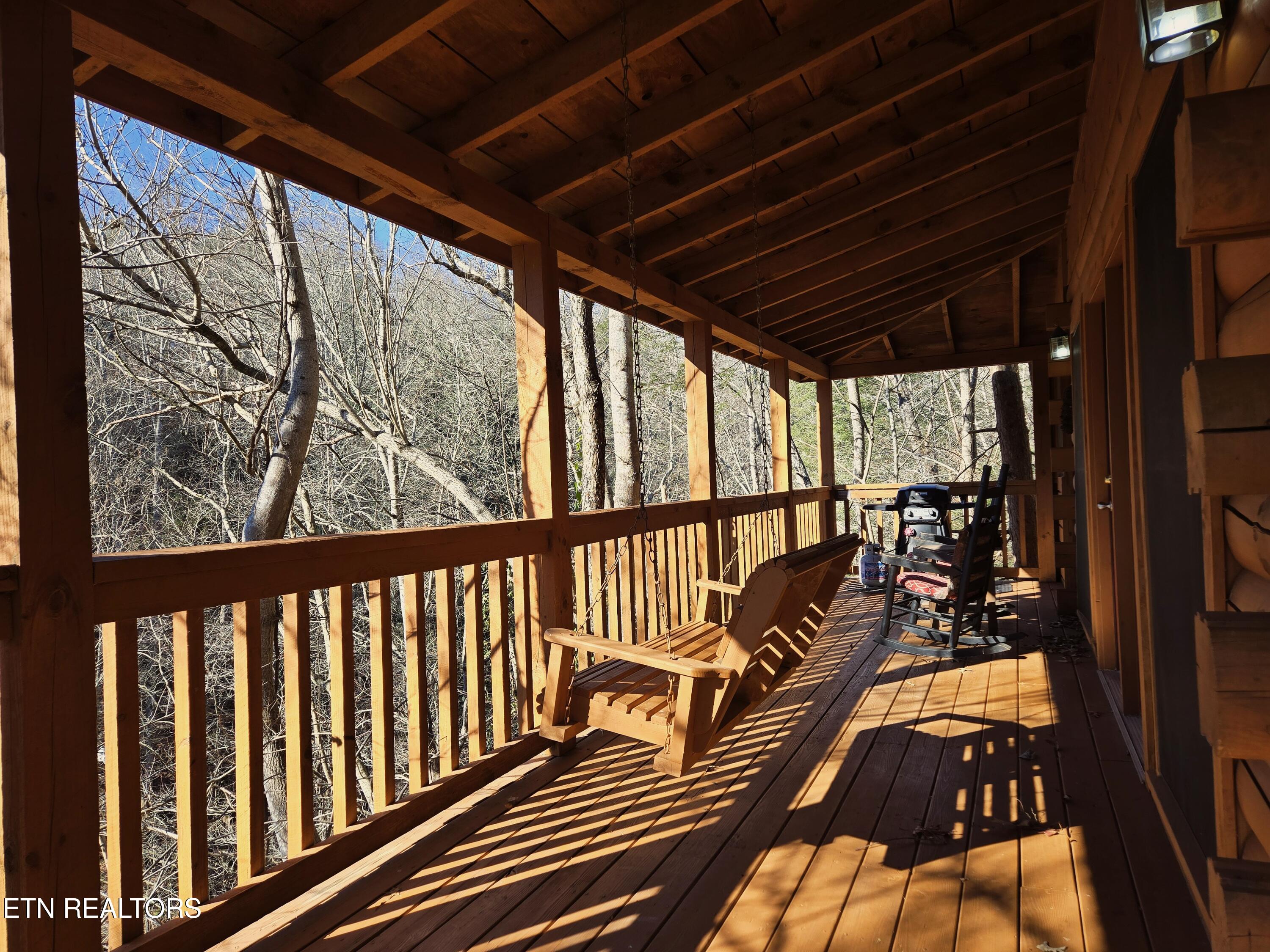 1580 Walt Price Road Sevierville, TN 37876 - Photo 6 of 37 1580 WPR EXT Entry Porch Swing 1