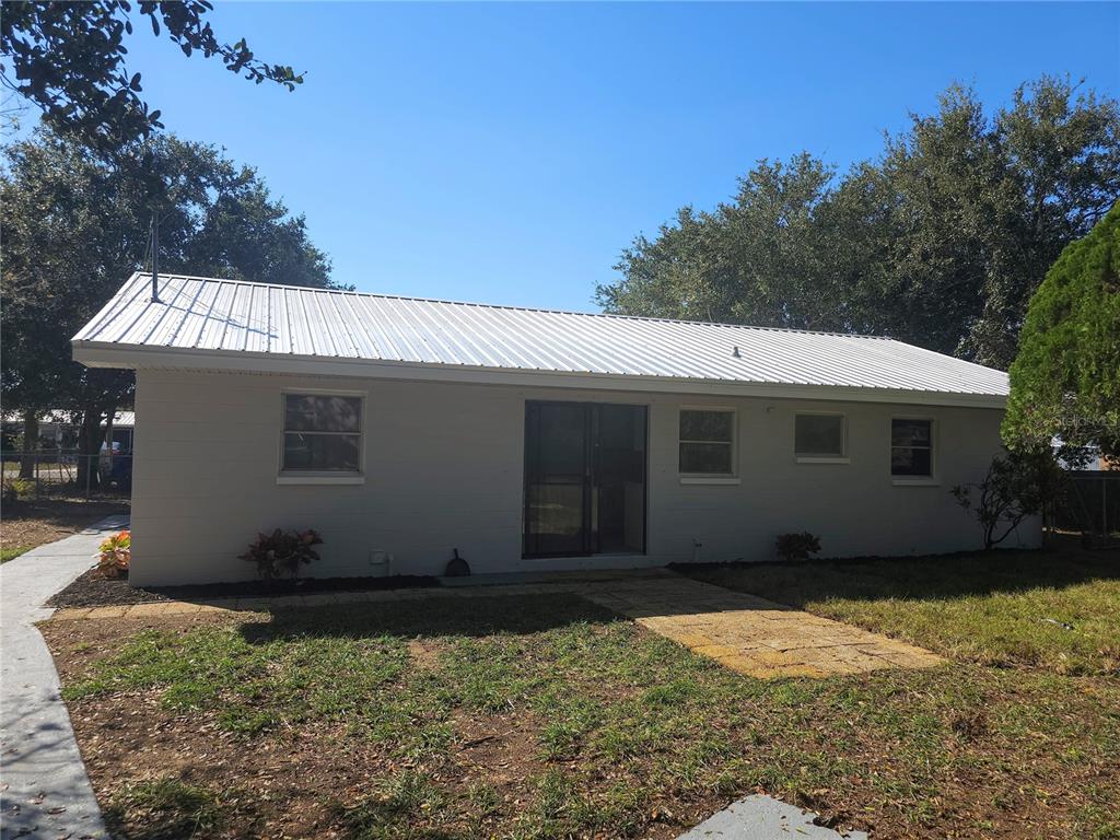 2720 North Avocado Road Avon Park, FL 33825 - Photo 12 of 35 a view of a house with a yard