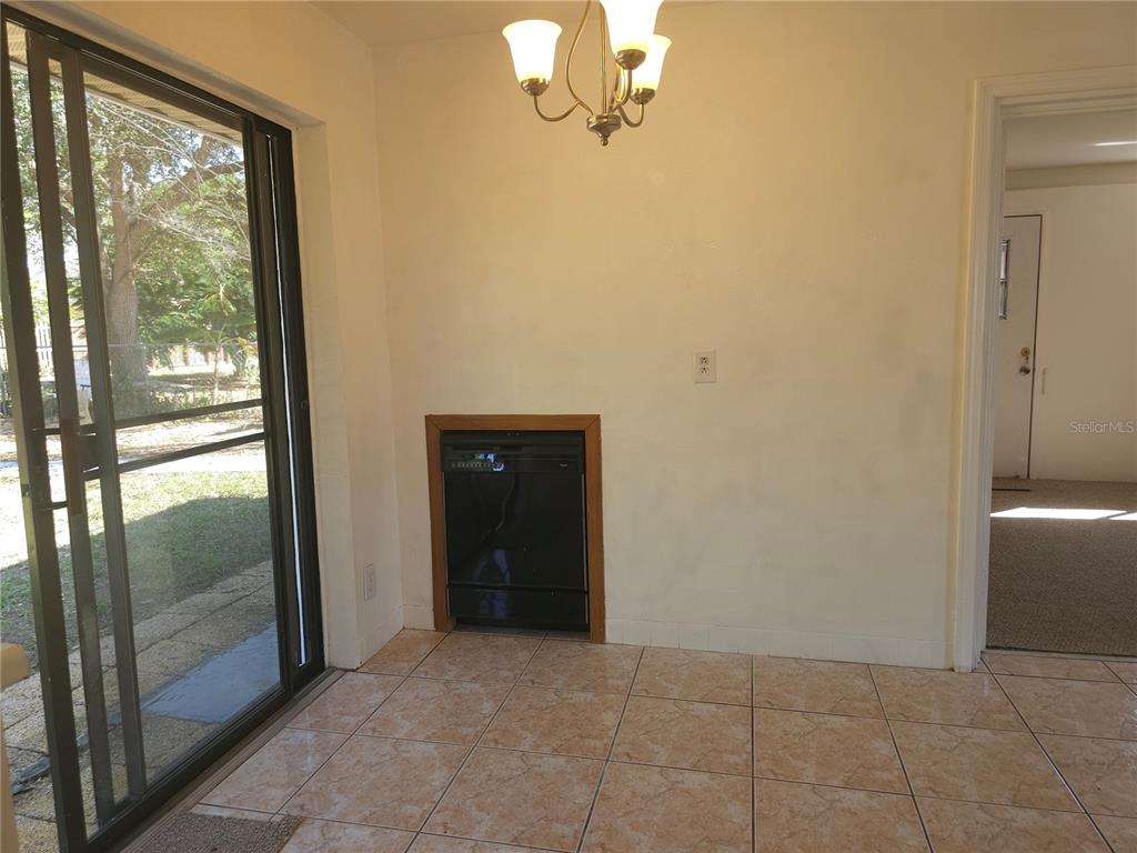 2720 North Avocado Road Avon Park, FL 33825 - Photo 14 of 35 a view of a bathroom from the hallway