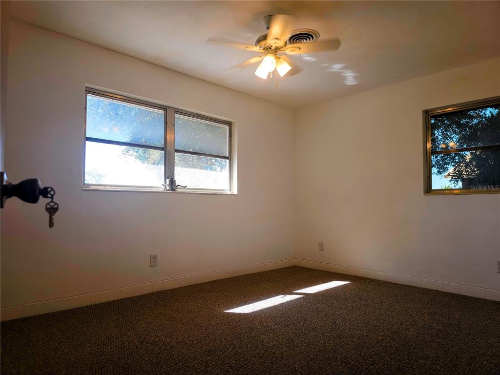 2720 North Avocado Road Avon Park, FL 33825 - Photo 23 of 35 a view of an empty room with a window