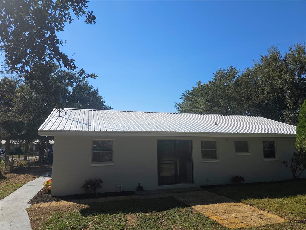 2720 North Avocado Road Avon Park, FL 33825 - Photo 3 of 35 a view of a house with a patio