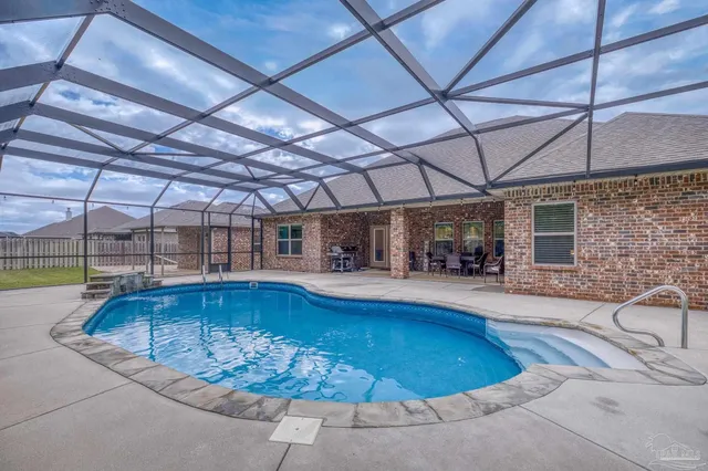 a view of a park with large trees