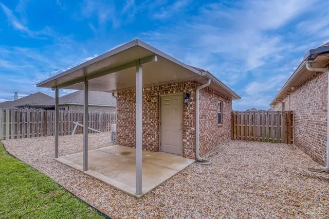 an aerial view of a house with swimming pool garden and mountain view