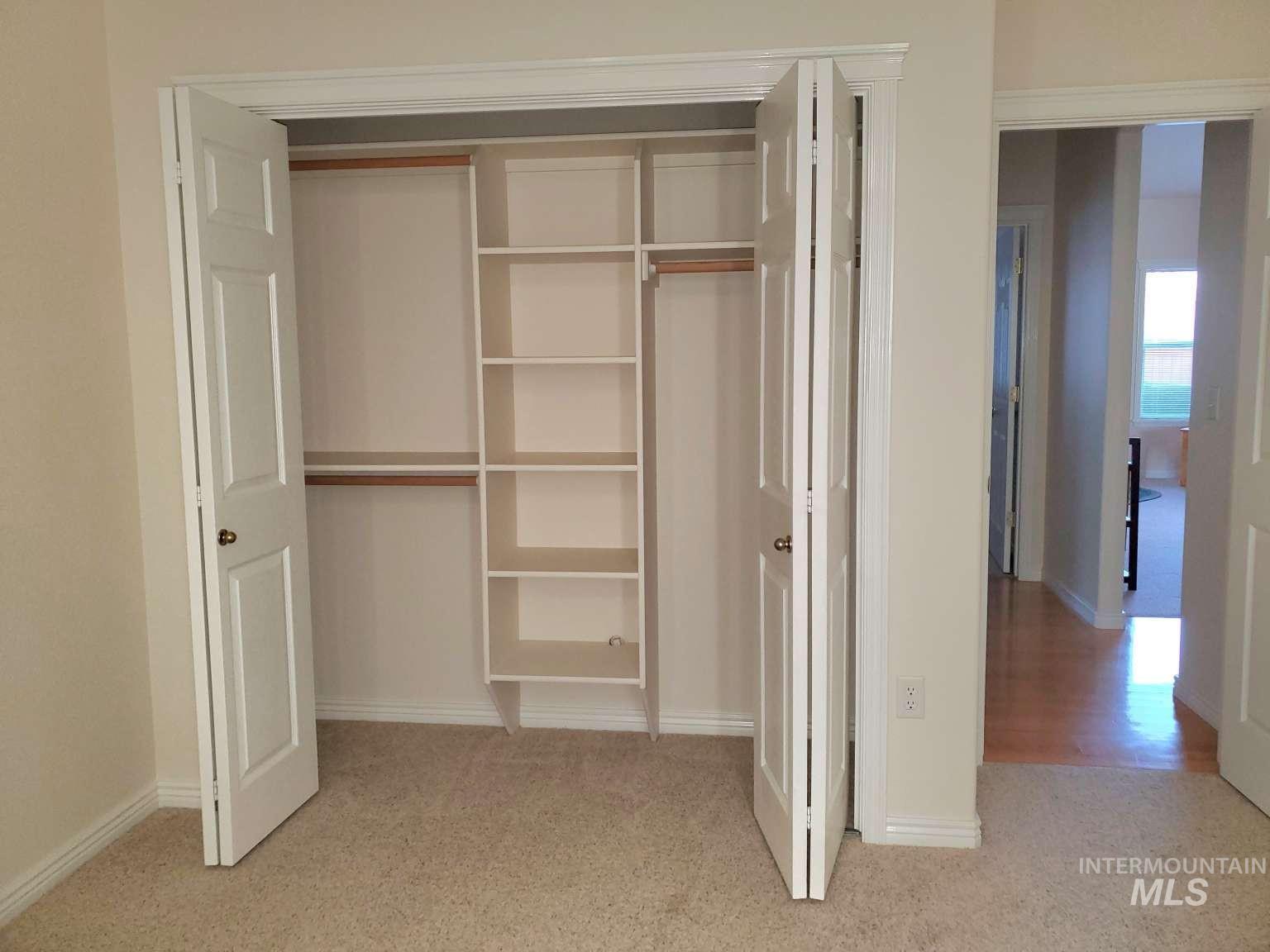 1100 East Wright Street Boise, ID 83706 - Photo 14 of 25 Built-in closet system featuring shelving and hanging rods