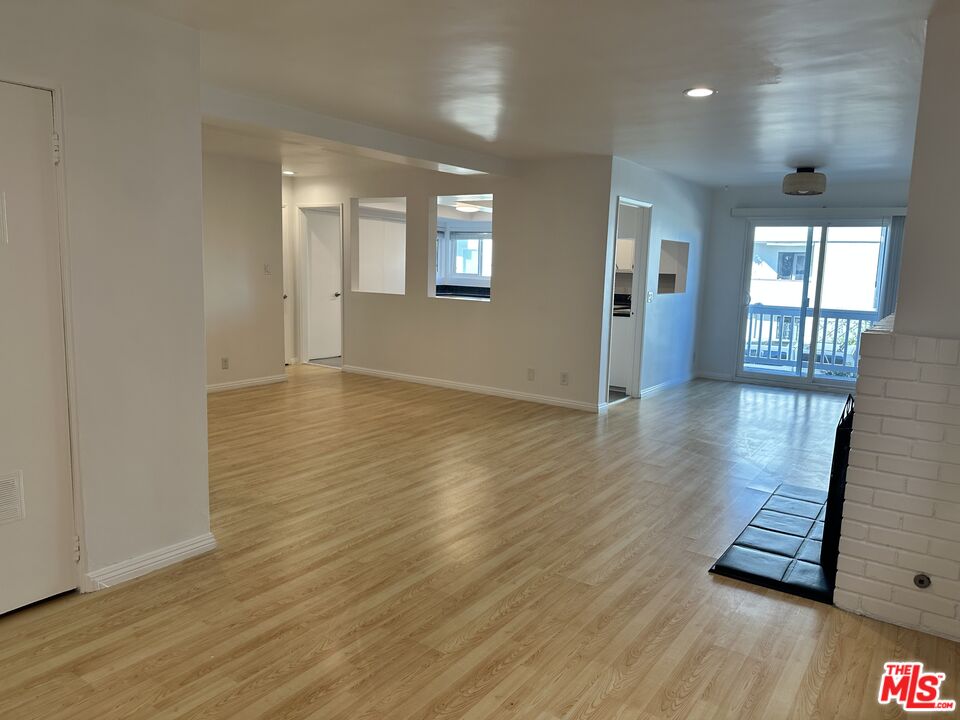 24 Lighthouse Street, Unit A Marina del Rey, CA 90292 - Photo 15 of 39 wooden floor in an empty room with a window