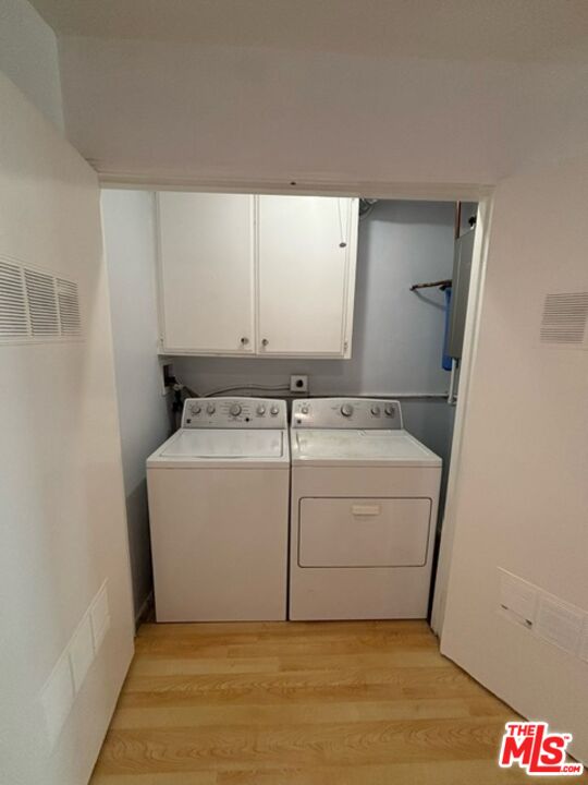 24 Lighthouse Street, Unit A Marina del Rey, CA 90292 - Photo 33 of 39 a bathroom with a sink and a mirror