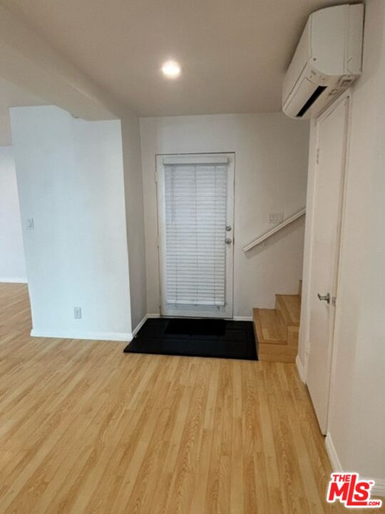 24 Lighthouse Street, Unit A Marina del Rey, CA 90292 - Photo 37 of 39 a walk in closet with wooden floor