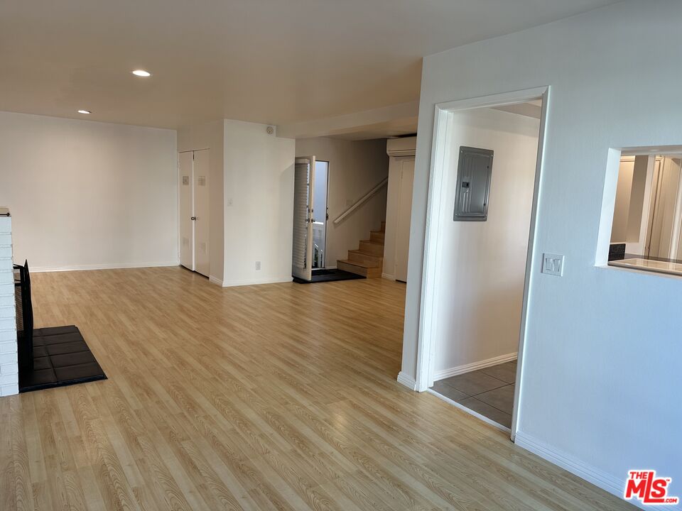 24 Lighthouse Street, Unit A Marina del Rey, CA 90292 - Photo 6 of 39 a view of empty room with wooden floor