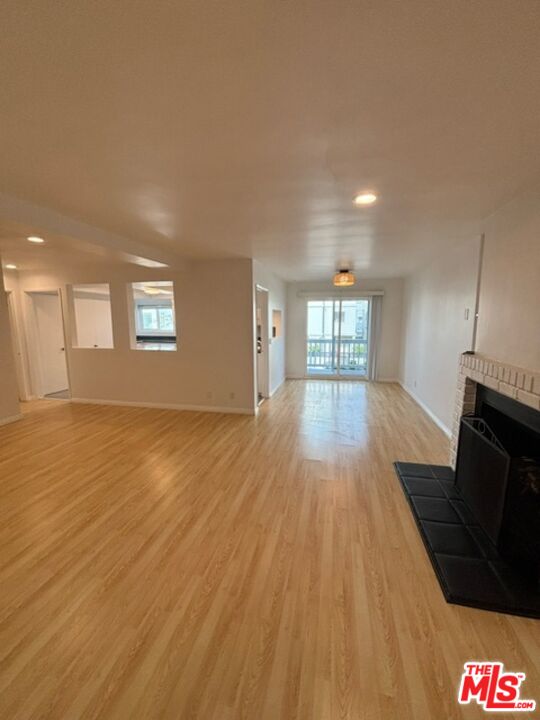 24 Lighthouse Street, Unit A Marina del Rey, CA 90292 - Photo 10 of 39 a view of a room wooden floor and staircase