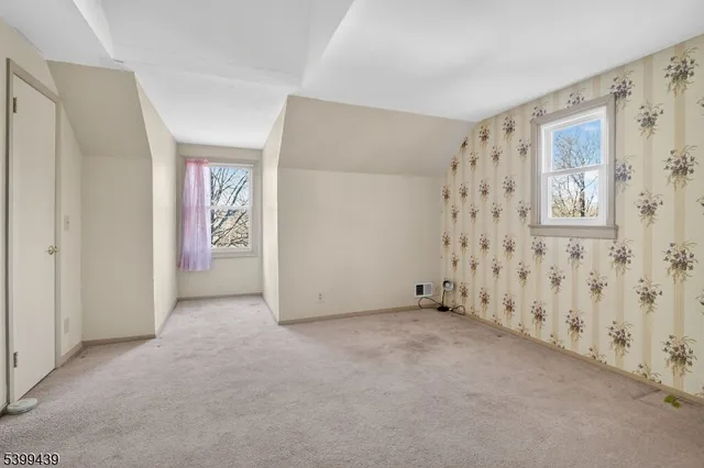 a bathroom with a sink vanity and a mirror